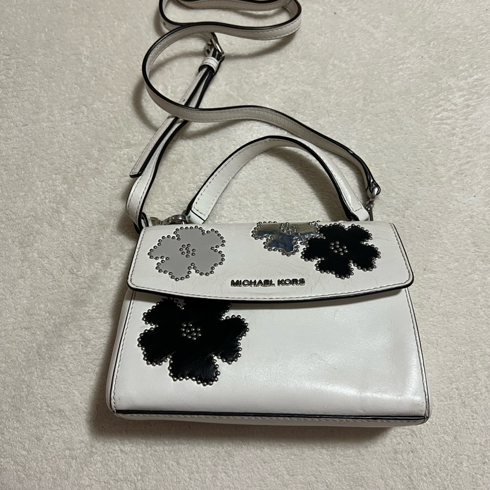 Micheal Kors white purse with flowers